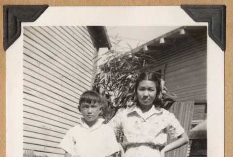 Boy and girl outside a building (ddr-densho-542-196)