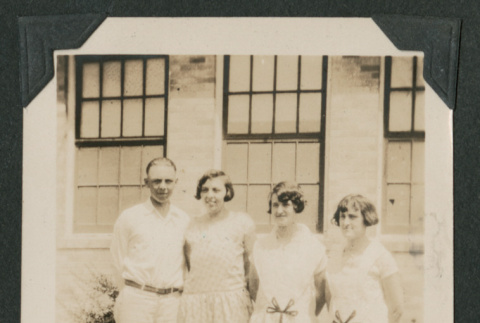 one man and three women outside a building (ddr-densho-378-496)