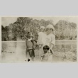 Issei woman with children at a lake (ddr-densho-182-121)