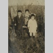 Three children on farm (ddr-densho-128-85)