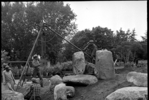 Four men setting boulders at D. Hill Nursery (ddr-densho-377-1423)
