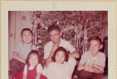 Five children by Christmas tree (ddr-densho-522-569)