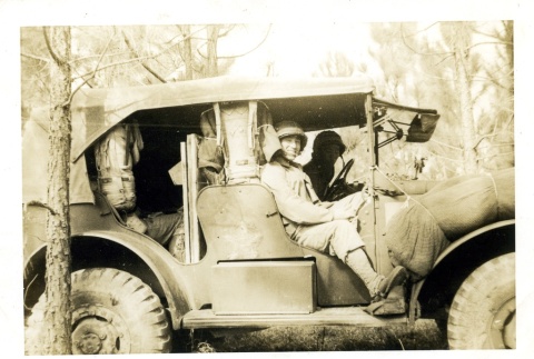 Soldiers in a jeep (ddr-densho-22-223)