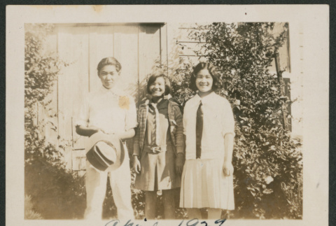 Three people outside (ddr-densho-378-592)