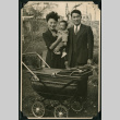 A mother, father, and baby pose behind a baby stroller. (ddr-densho-359-422)