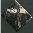 Woman standing in yard (ddr-densho-483-548)