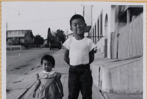 Susan and William Shiomi on sidewalk (ddr-densho-522-276)