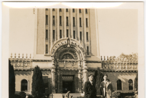 Two men standing in garden outside building (ddr-densho-426-1635)