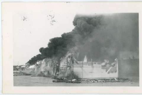 Building engulfed in smoke (ddr-densho-37-2145)