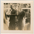 Men walking down gangplank from ship (ddr-densho-426-1628)
