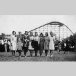 Women in front of roller coaster (ddr-densho-136-25)