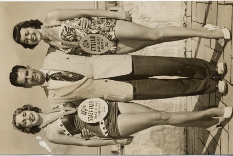 Honolulu Jaycee chairman and two young women posing for a publicity photo (ddr-njpa-2-691)