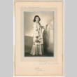 Portrait of Yoshiko Nishisaka Wearing Dress and Silk Jacket (ddr-densho-474-124)