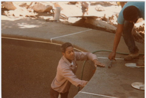 Two men working on pool (ddr-densho-377-1810)