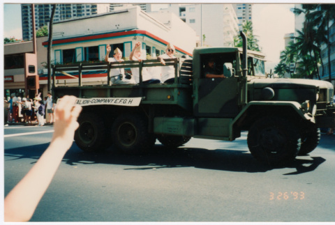 Truck carrying veterans from 2nd Battalion-Company E.F.G.H in parade (ddr-densho-368-417)