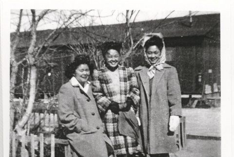 Three women in front of barracks (ddr-manz-10-146)