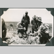 Four men with mortar (ddr-ajah-2-98)