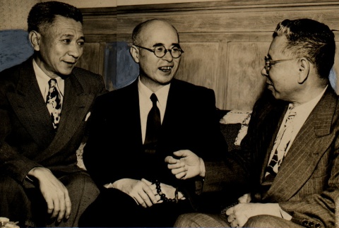 A Buddhist bishop talking with two men (ddr-njpa-4-1709)