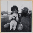 Girl holding dog (ddr-densho-522-110)