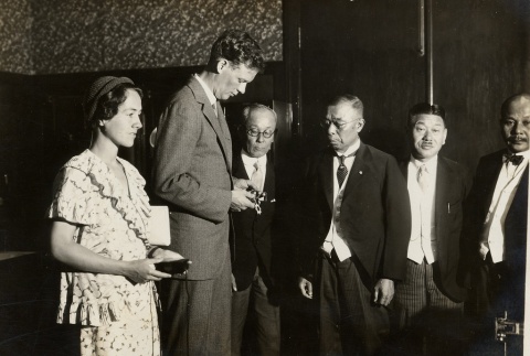 Charles and Anne Lindbergh receiving gifts (ddr-njpa-1-1174)