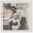 Woman holding a baby (ddr-densho-433-572)