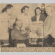 Samuel Wilder King being shown a fire prevention poster (ddr-njpa-2-110)