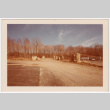 Rock pilars lining dirt road (ddr-densho-377-2176)