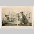 Soldier aboard ship on city waterfront (ddr-densho-368-135)