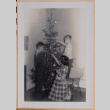 David, Peter, and Mary Alice  decorating Christmas tree (ddr-densho-462-274)
