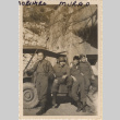 Four men in front of a jeep (ddr-densho-466-288)