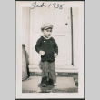 Photo of a child next to a pram (ddr-densho-483-711)