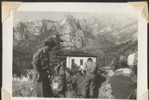 Men in fatigues with mountains in background (ddr-densho-466-647)