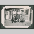 Six men outside barrack (ddr-densho-471-107)