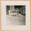 Group of children in barracks doorway (ddr-densho-493-48)