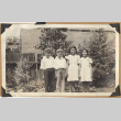 Four children smiling outdoors (ddr-densho-542-178)