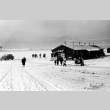 Japanese Americans walking in the snow (ddr-densho-37-240)