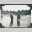 Two men wading across river (ddr-ajah-2-247)