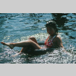 Andrea Tong floating on the lake (ddr-densho-336-1143)