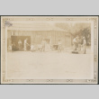 Group of men working outside barn (ddr-densho-316-286)