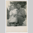 Soldier and young girl (ddr-densho-368-215)