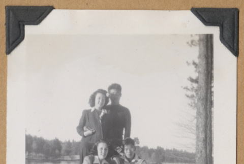 Group on a boulder (ddr-densho-542-316)
