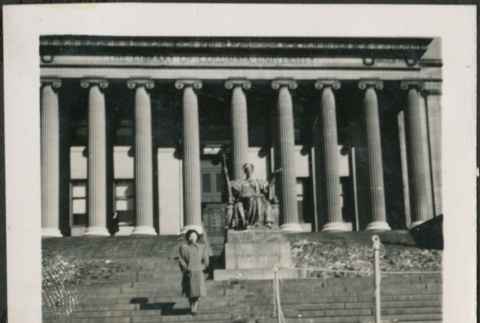 A woman in front of Columbia University Library (ddr-densho-298-225)
