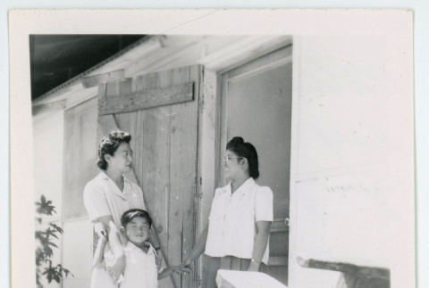 Mother and son say goodbye to a teacher (ddr-densho-37-2135)