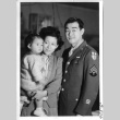 Nisei serviceman with wife and daughter (ddr-densho-37-751)