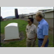 William Kochiyama and Robert H. Foote driving to and walking around a Cornell university farm (ddr-densho-1007-1518)