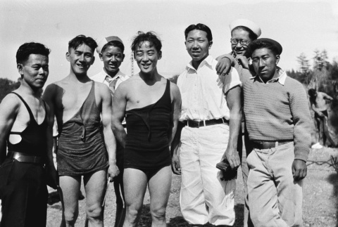 Group of men at beach (ddr-ajah-6-761)