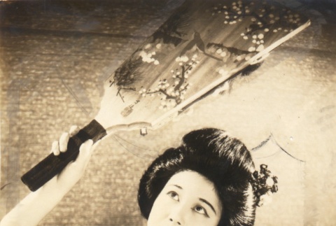 Shizue Natsukawa posing with a hagoita (ddr-njpa-4-1385)