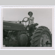 on a tractor (ddr-densho-378-1111)