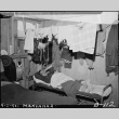 Japanese American resting in a barrack (ddr-densho-37-412)