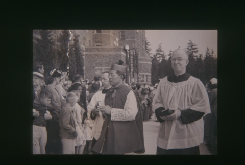 (Slide) - Image of priests among crowd outside building (ddr-densho-330-63-master-a99f00a157)